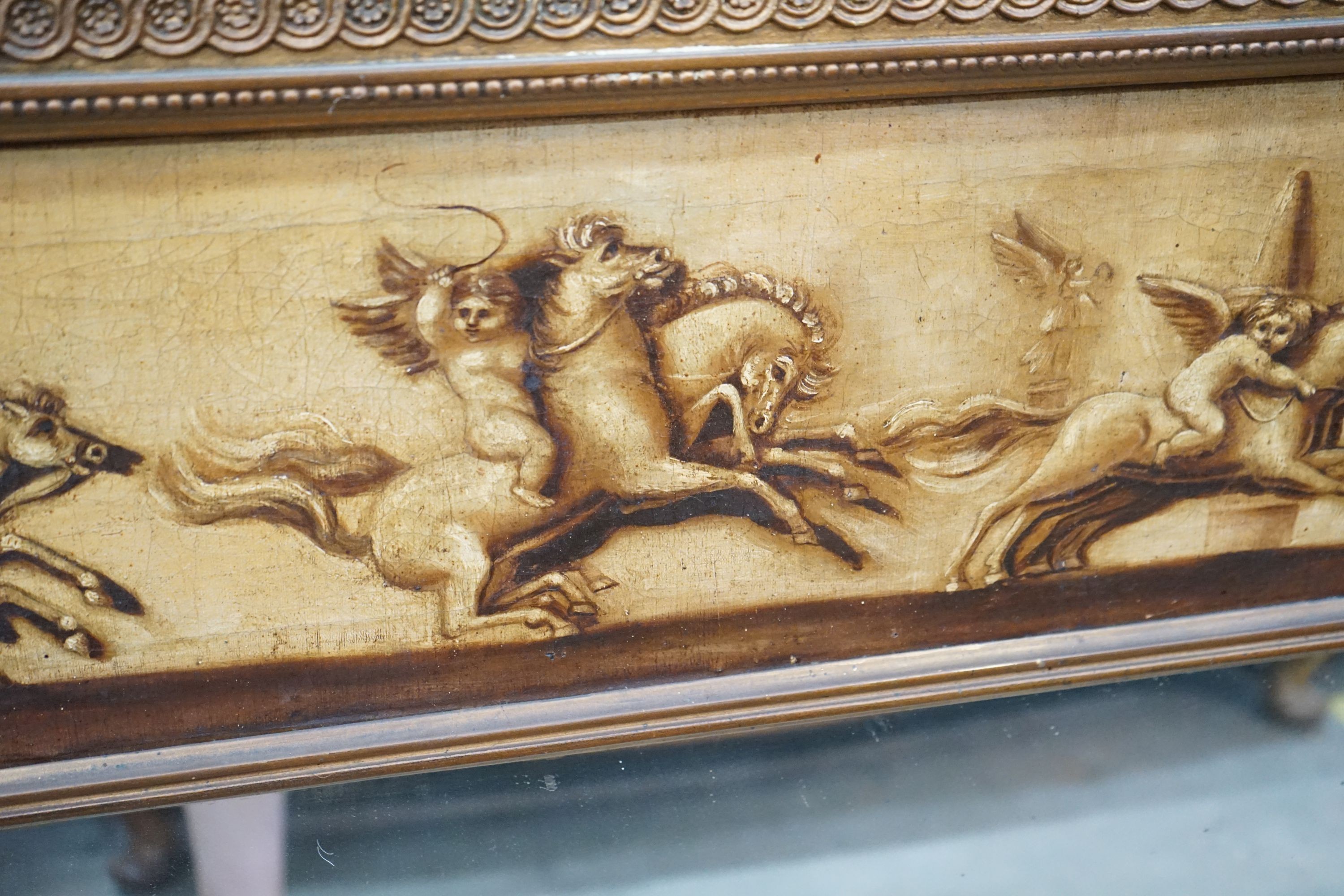 A 19th century and later gilt framed overmantel mirror with oil on canvas frieze decorated with putti, width 142cm, height 96cm